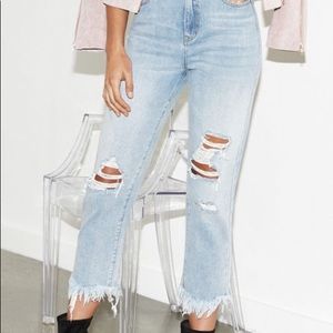 Kendall and Kylie Shag Blue Ripped Mom Jeans